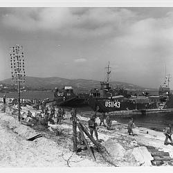 Southern France Invasion, August 1944. USS LCI-513 and LCT-1143 unloading on (…)
