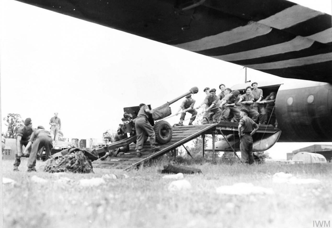 A SIX-POUNDER ANTI-TANK GUN BEING HAULED INTO A HORSA GLIDER AT KEEVIL - 5TH JUNE 1944