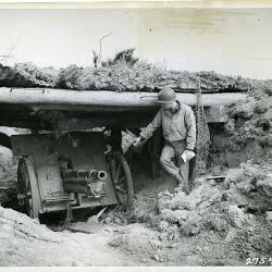 American Soldier and a German Gun at Omaha Beach