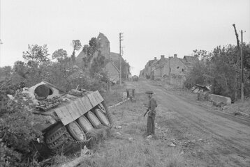 Knocked-out German Panther tanks on the outskirts of Lingevres, 20 June 1944.
