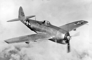 XP-47N flying over the Pacific during World War II