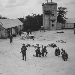 American Troops Have Just Cleared of German Snipers in the Yard of a (…)